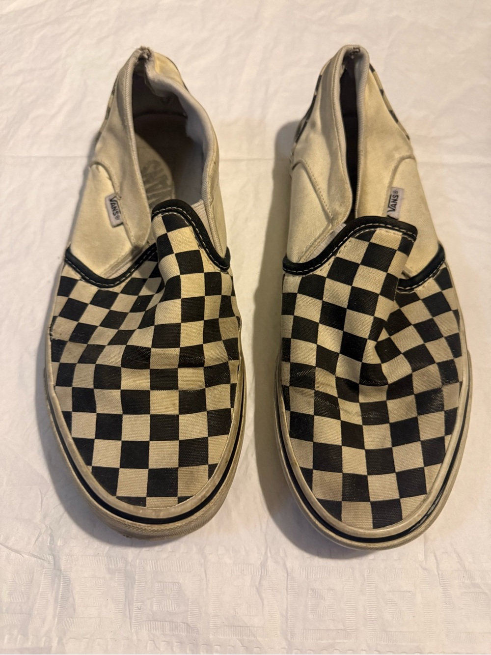 Vans Checkerboard Slip-On Sneakers in Black and White